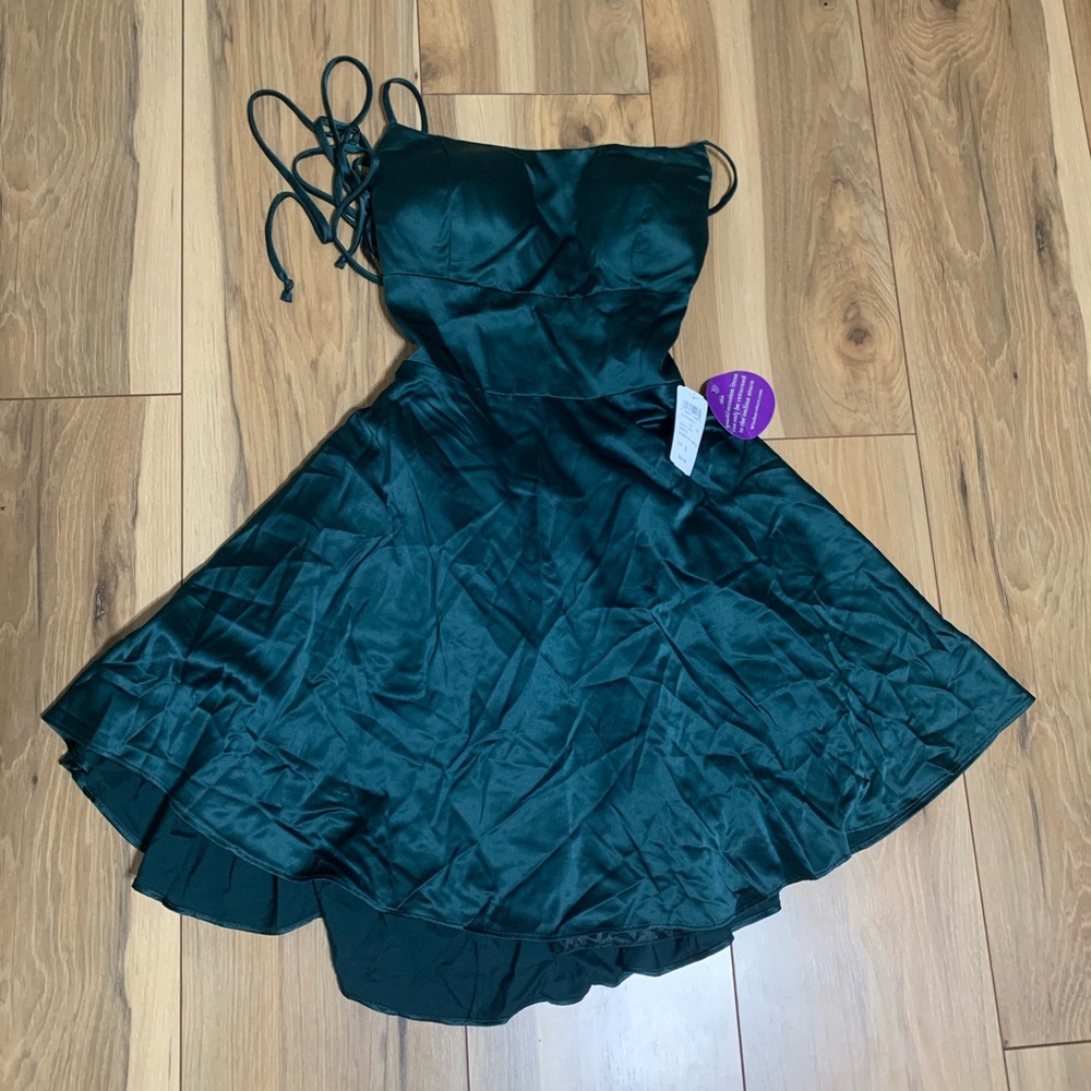 Green satin strapped/flared dress